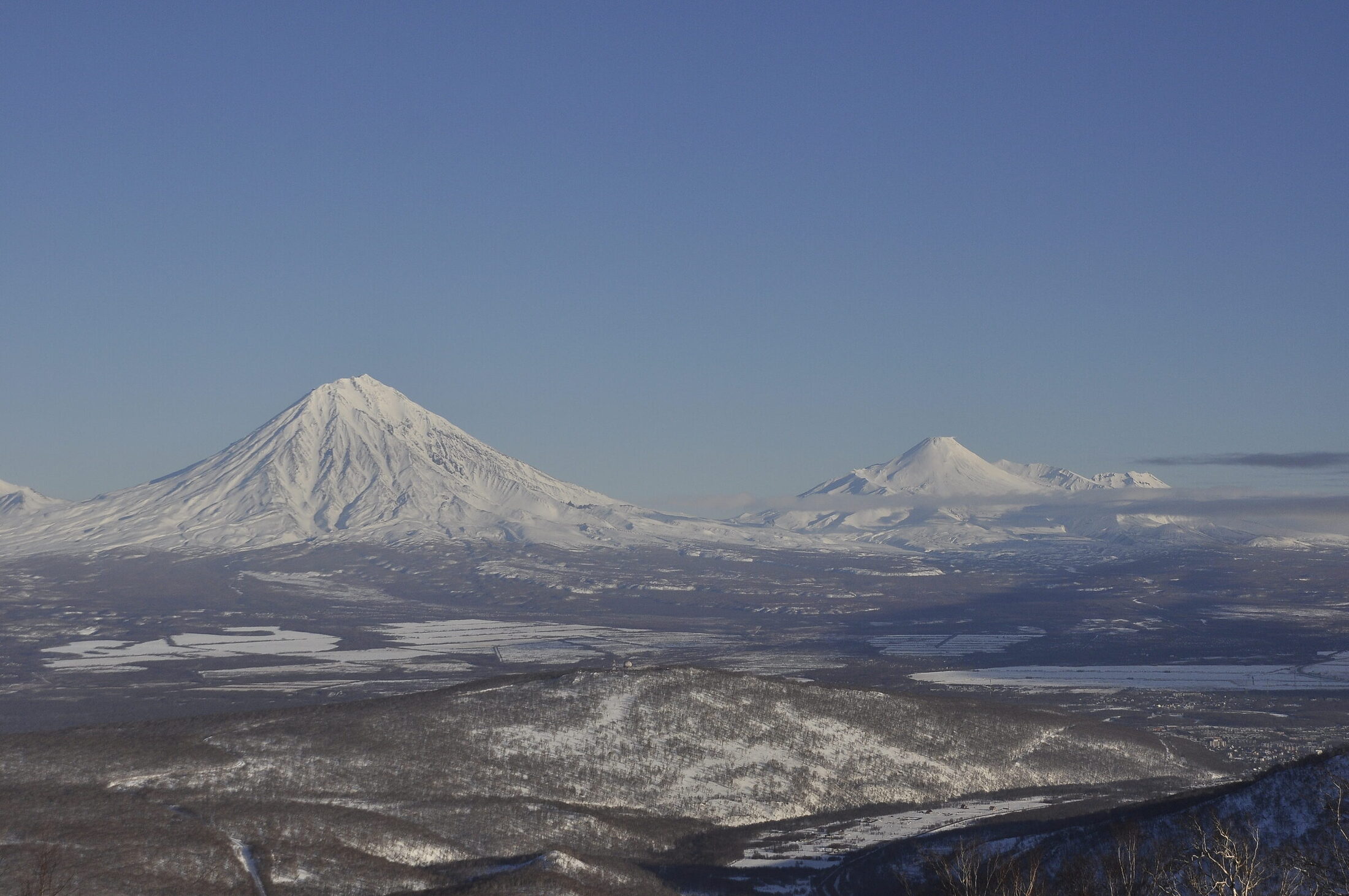 Volcanoes in winter: Koryaksky and Avachinsky.