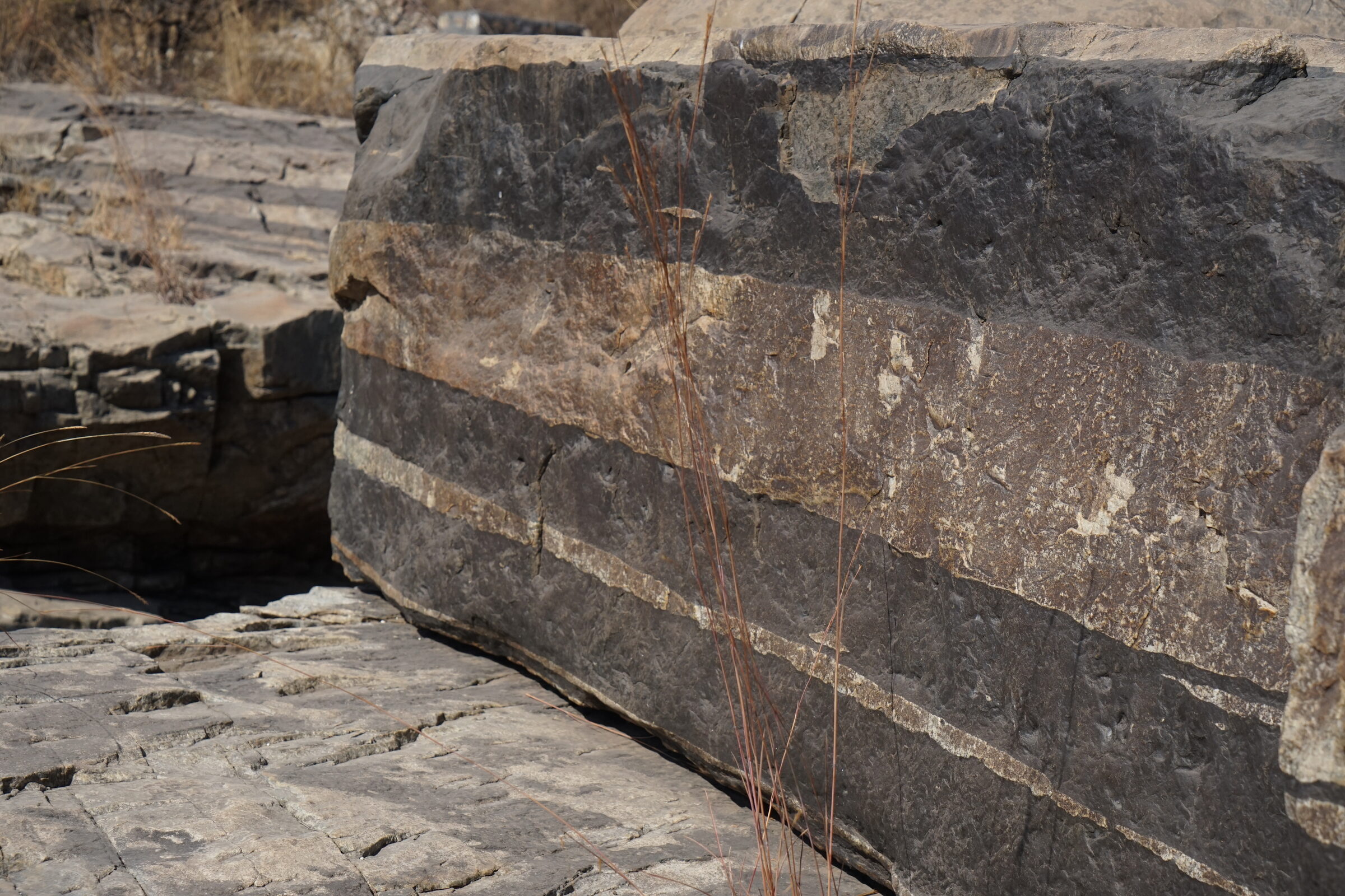 Layered intrusion landscape from Anton Kutyrev's field photography.